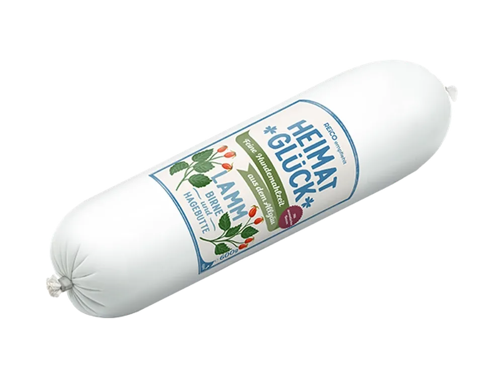 HEIMATGLÜCK Lamm – offizielles REiCO Produktmotiv, freigestellt auf transparentem Hintergrund.
